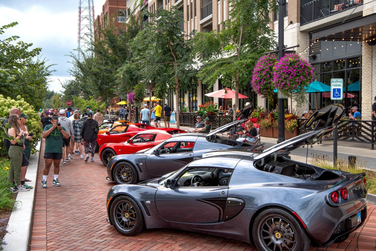 Classic and exotic cars lining the streets of the Carmel Arts & Design District during Artomobilia