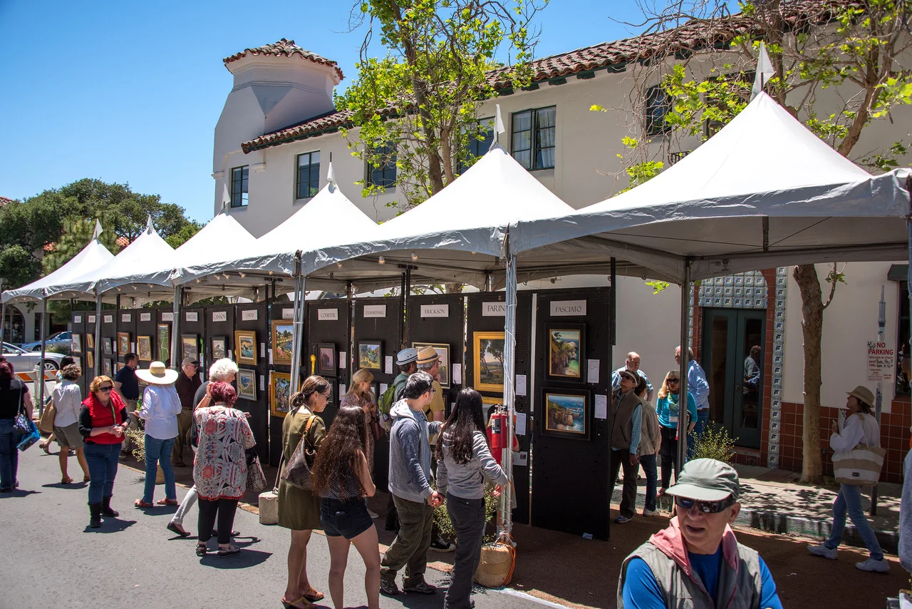 Artist booths lining Main Street during the Carmel International Arts Festival