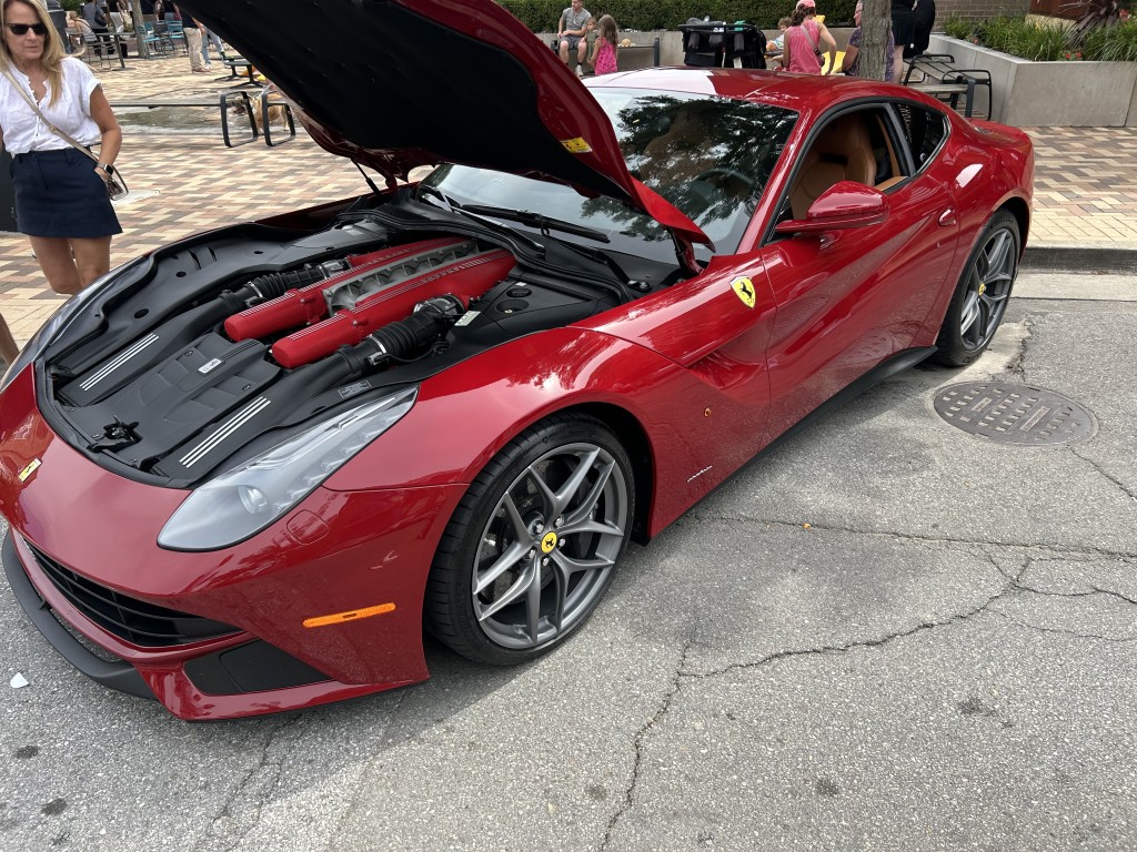A Ferrari parked along the street at Artomobilia in Carmel, Indiana